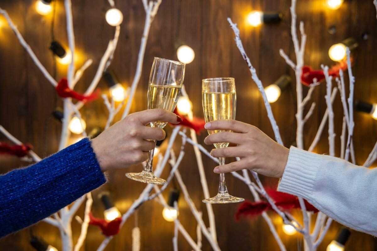 Cheers with champagne in festive setting
